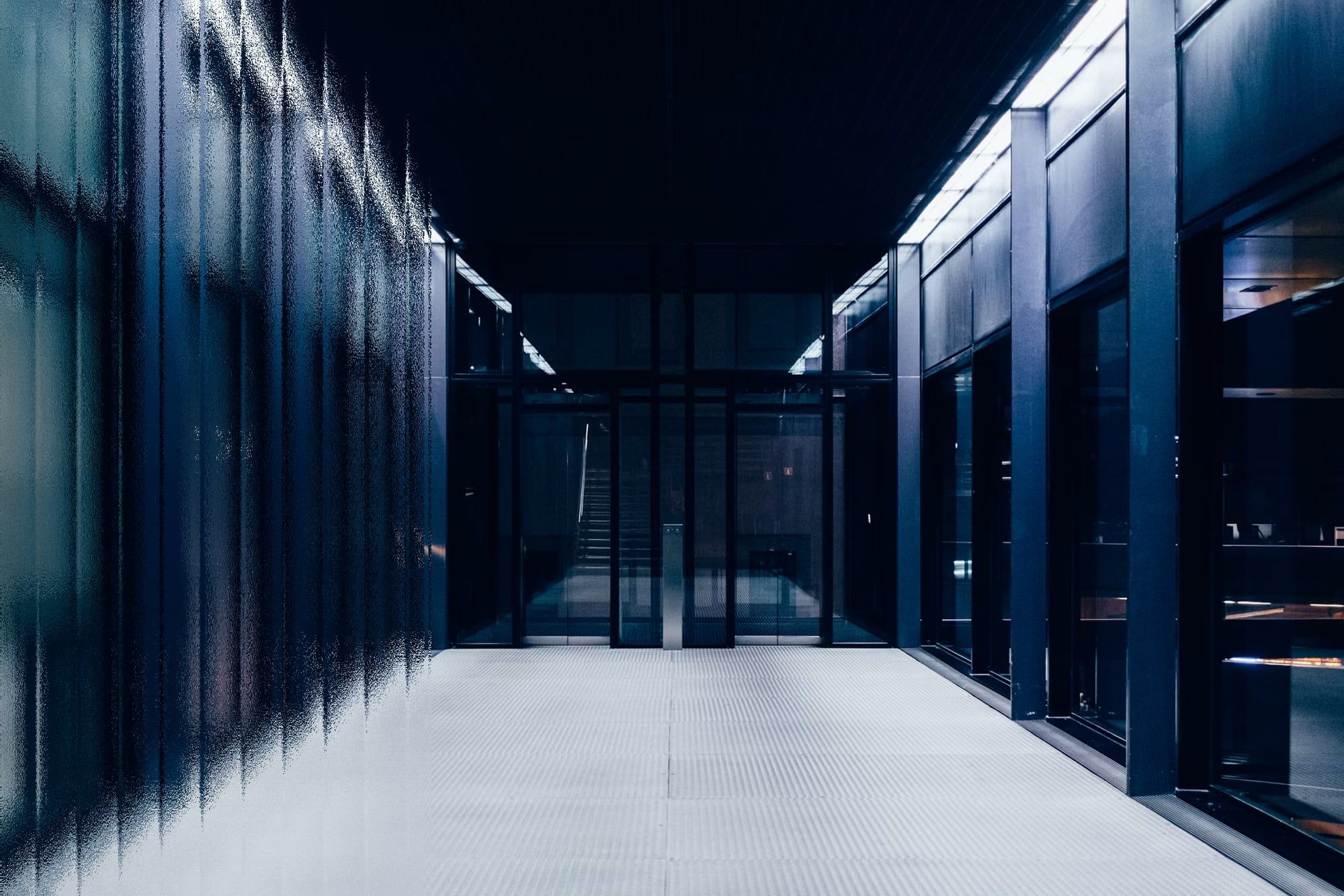 Corridor of server racks in a data centre